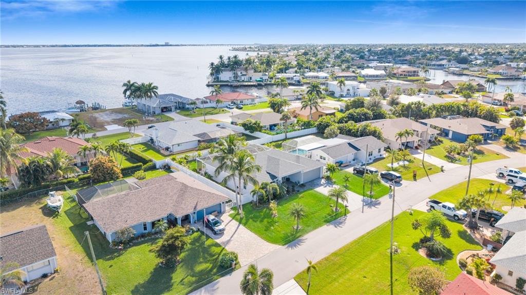 Aerial view of residential area with a large body of water