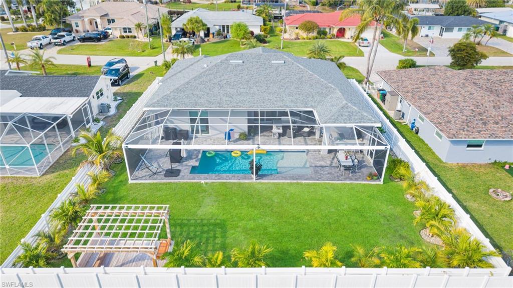 Aerial view of residential area with a pool area