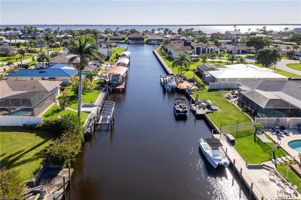 Aerial view of residential area with a large body of water