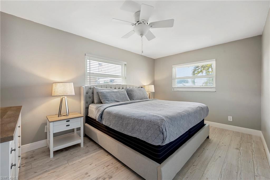 Bedroom featuring light wood finished floors and a ceiling fan