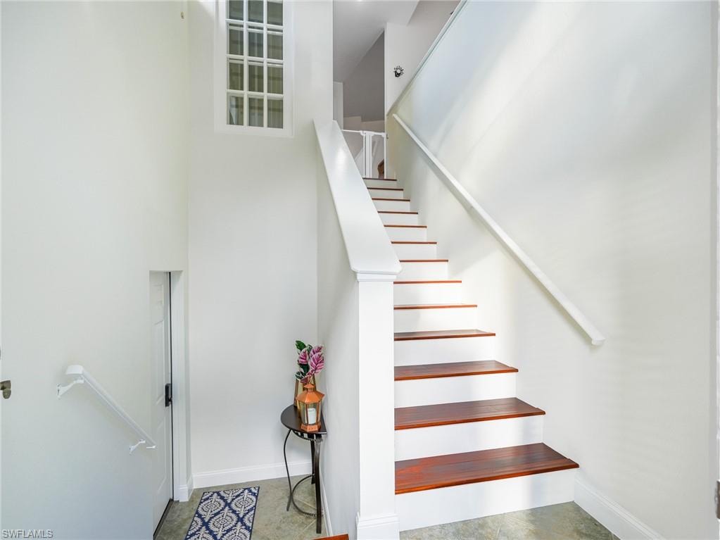 Stairs featuring baseboards