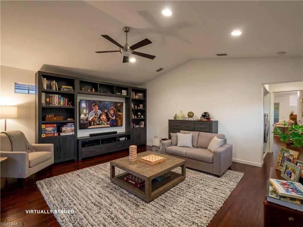 Bonus Room Virtually Staged featuring dark wood finished floors, vaulted ceiling, a ceiling fan, and recessed lighting
