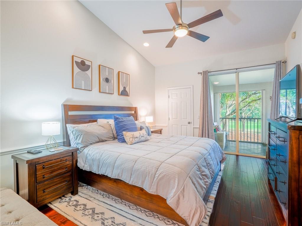 Bedroom with dark wood-type flooring, access to outside, a ceiling fan, and recessed lighting