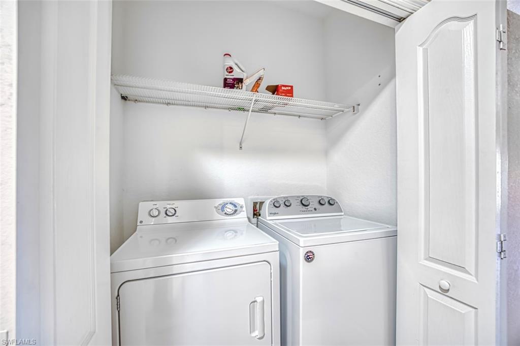 Laundry area featuring washer and clothes dryer