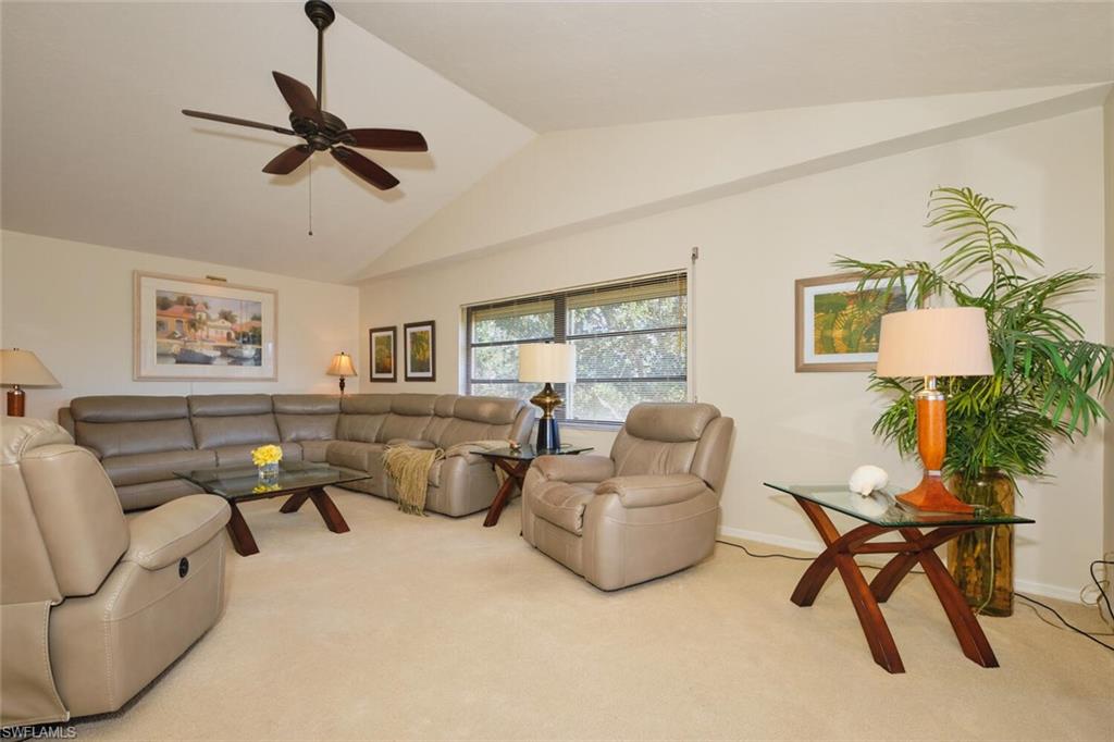 LIVING ROOM WITH CATHEDRAL CEILING