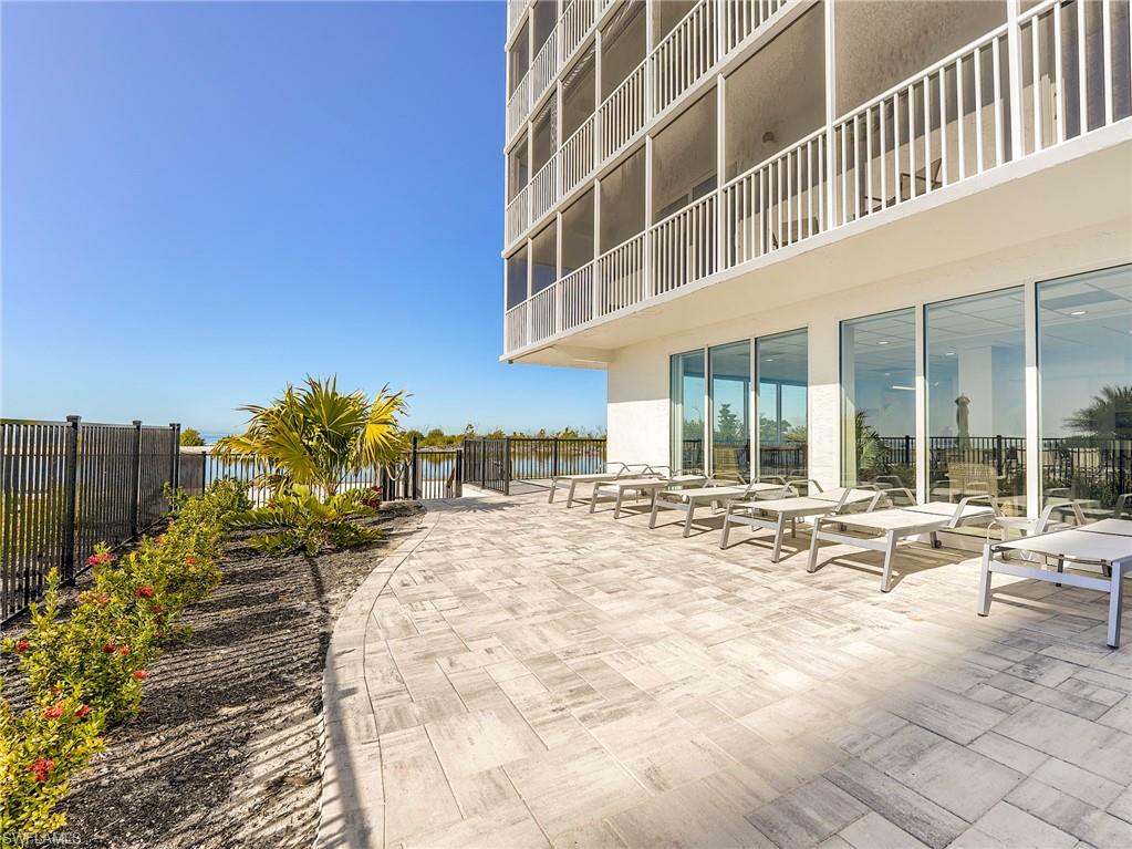 Patio / terrace featuring a water view and a patio