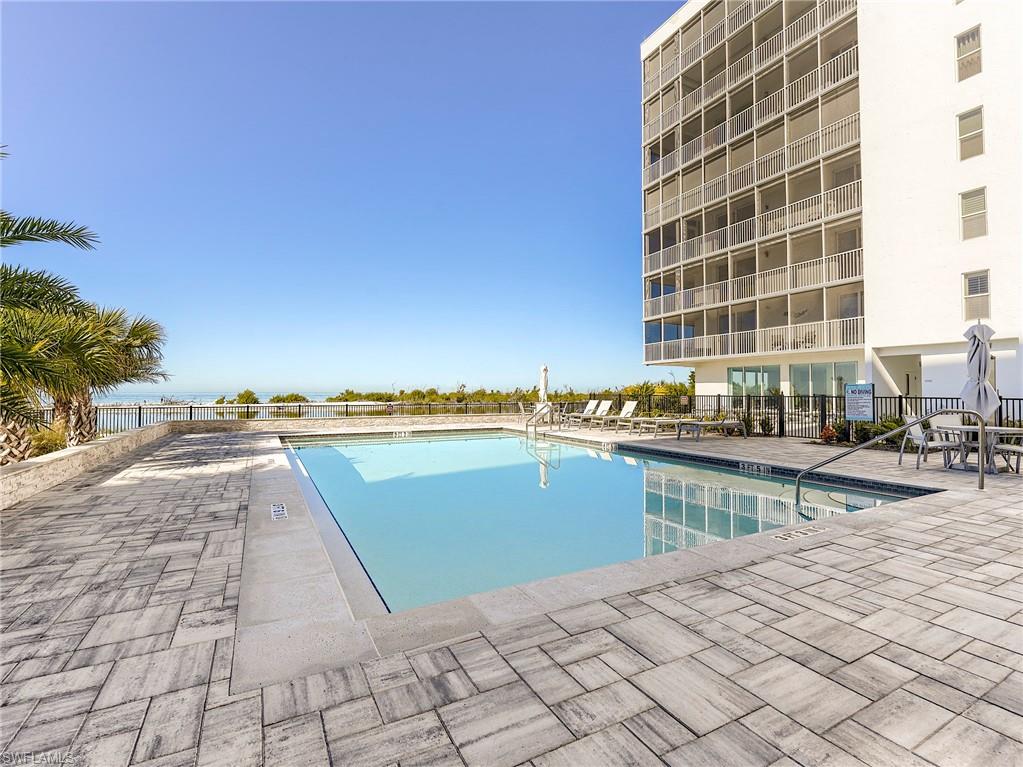 Community pool featuring a patio area