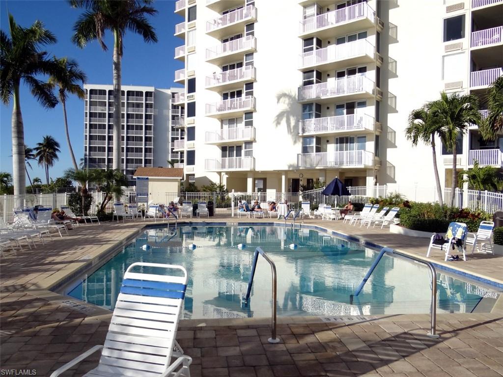 Community pool with a patio area