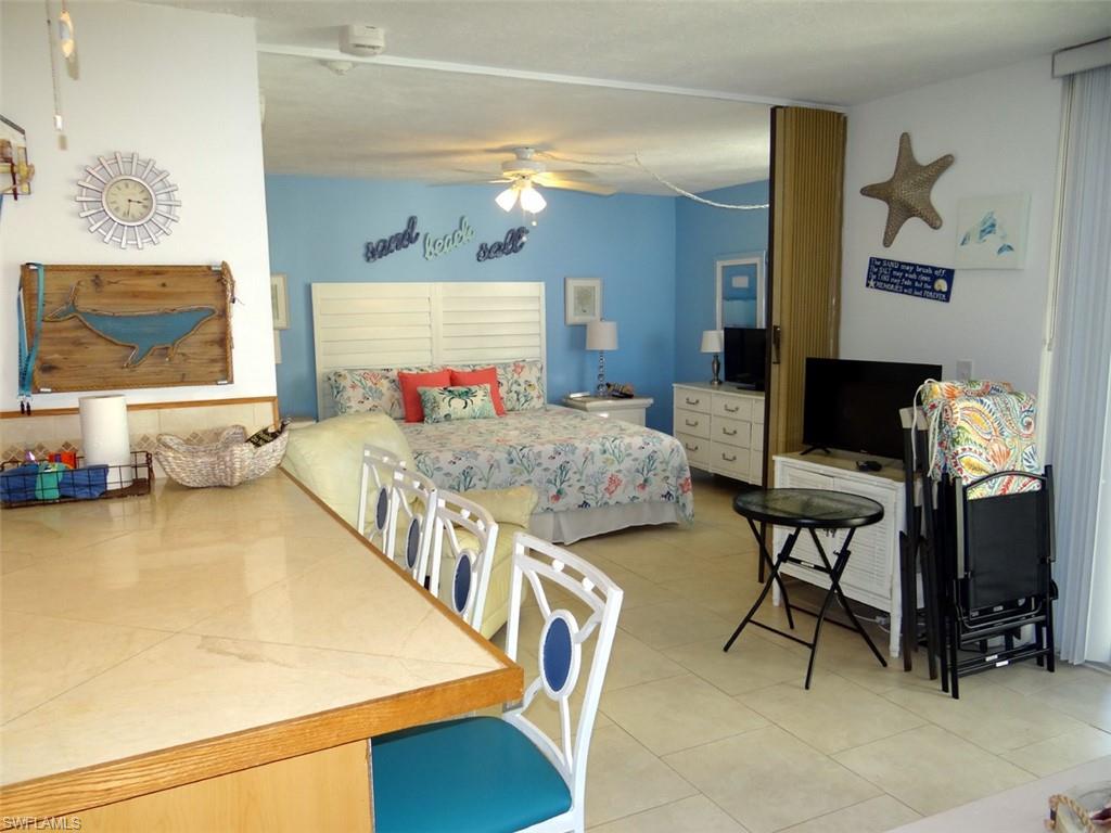 Bedroom featuring ceiling fan and light tile patterned floors