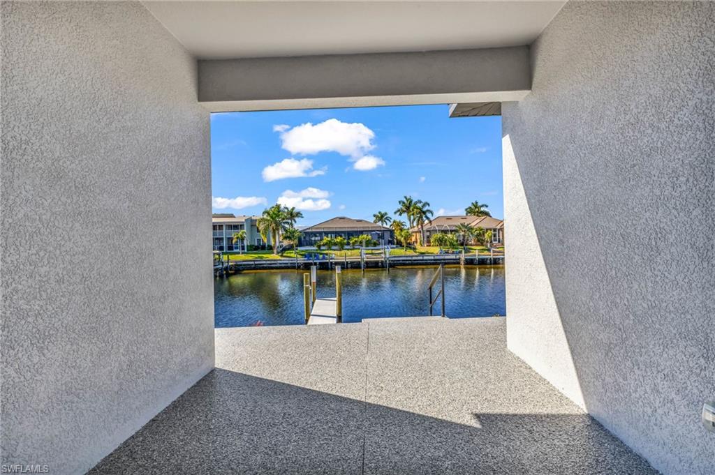 Water view with a boat dock