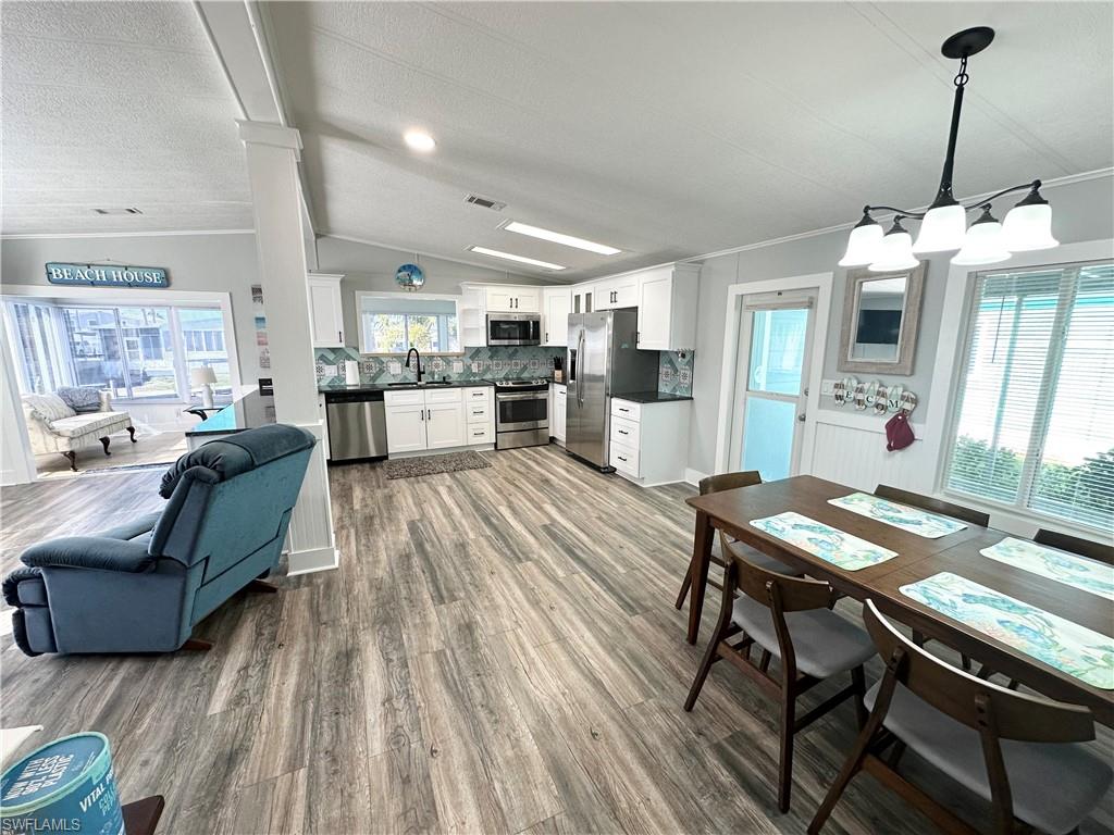 Big dining area adjacent to kitchen and living area