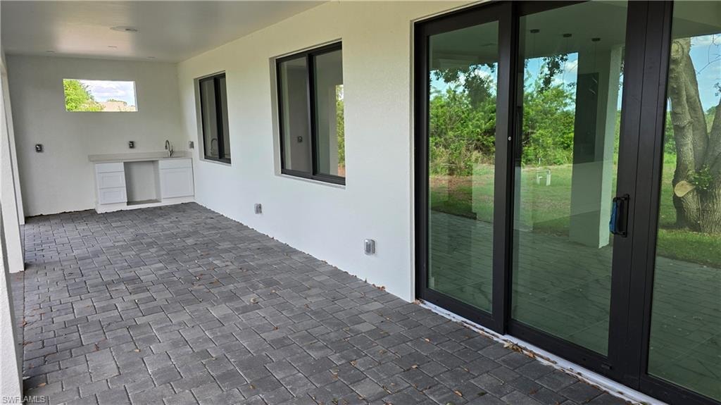Lanai w/ Pavers & Kit Sink & Cabinets w/ QUARTZ TOP
