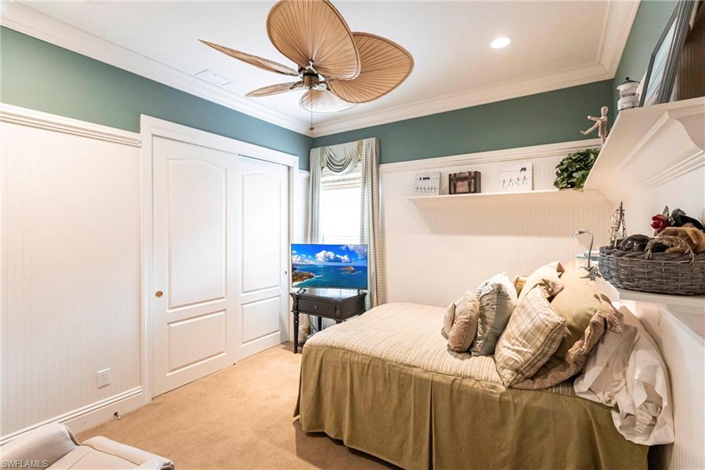 Bedroom featuring crown molding, light colored carpet, a closet, ceiling fan, and recessed lighting