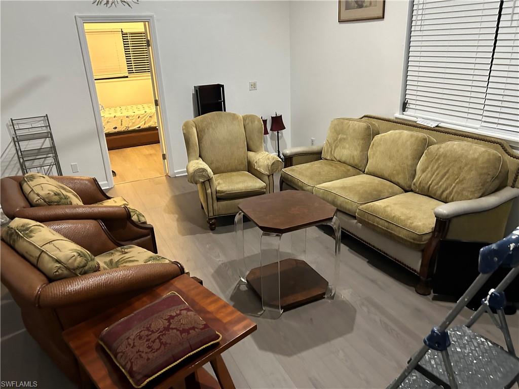 Living room featuring hardwood / wood-style floors