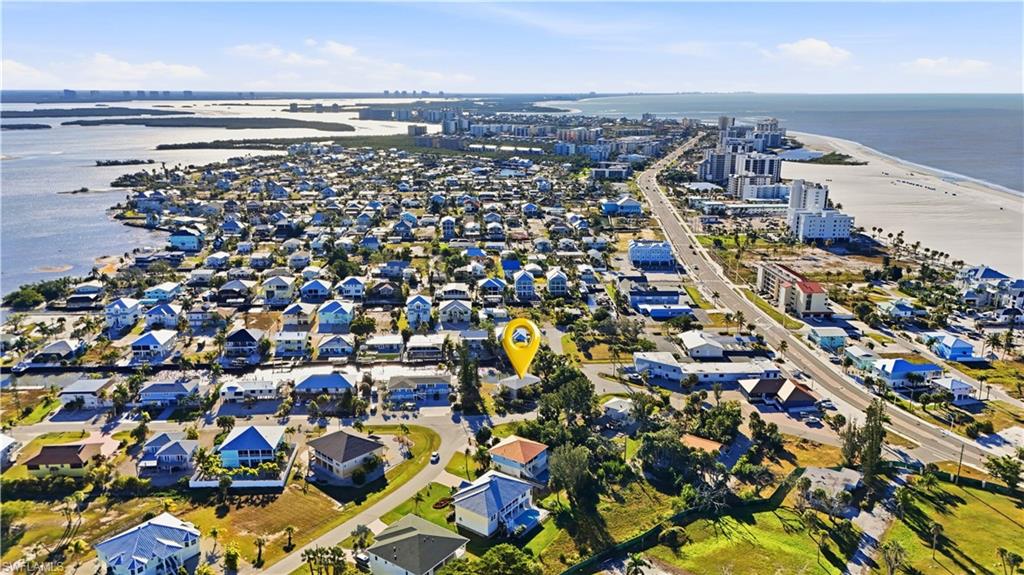 View of urban area with expansive beach - Virtually Edited Image