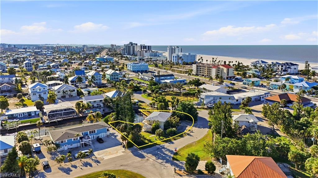 View of urban area with a nearby body of water - Virtually Edited Image