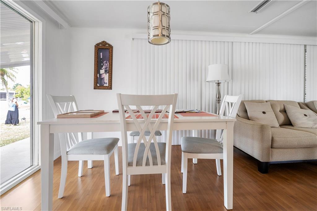 Dining space with wood finished floors