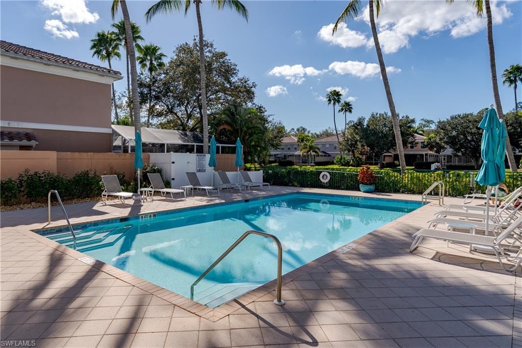 Community room with gate leading to pool