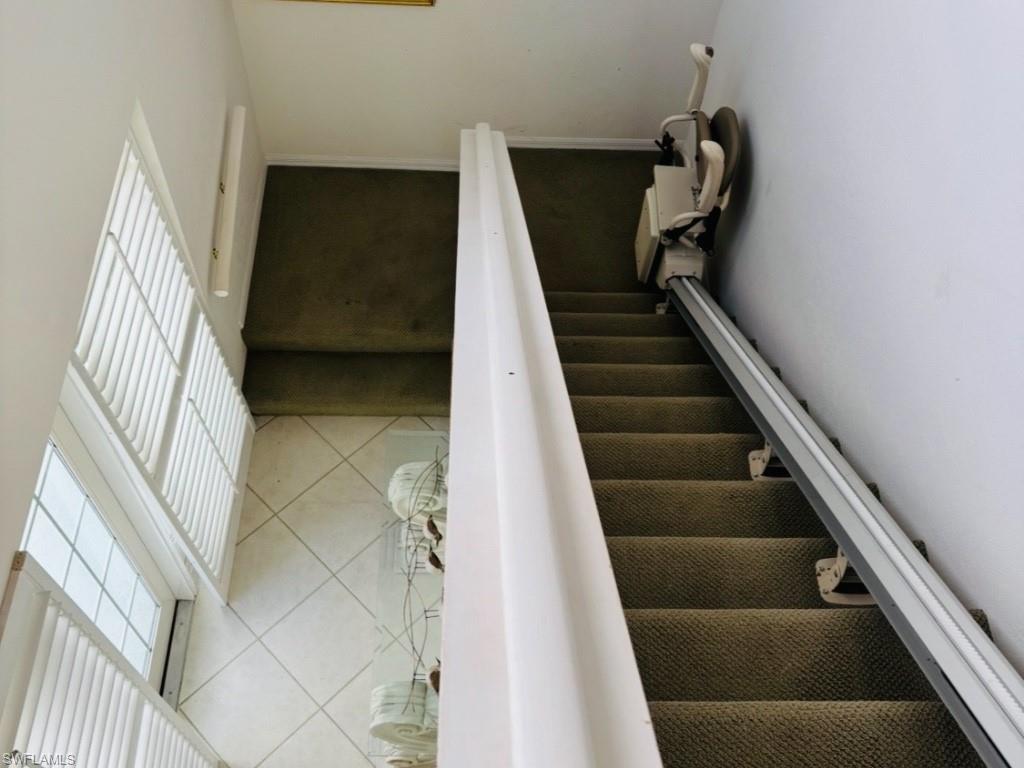 Stairway with tile patterned floors