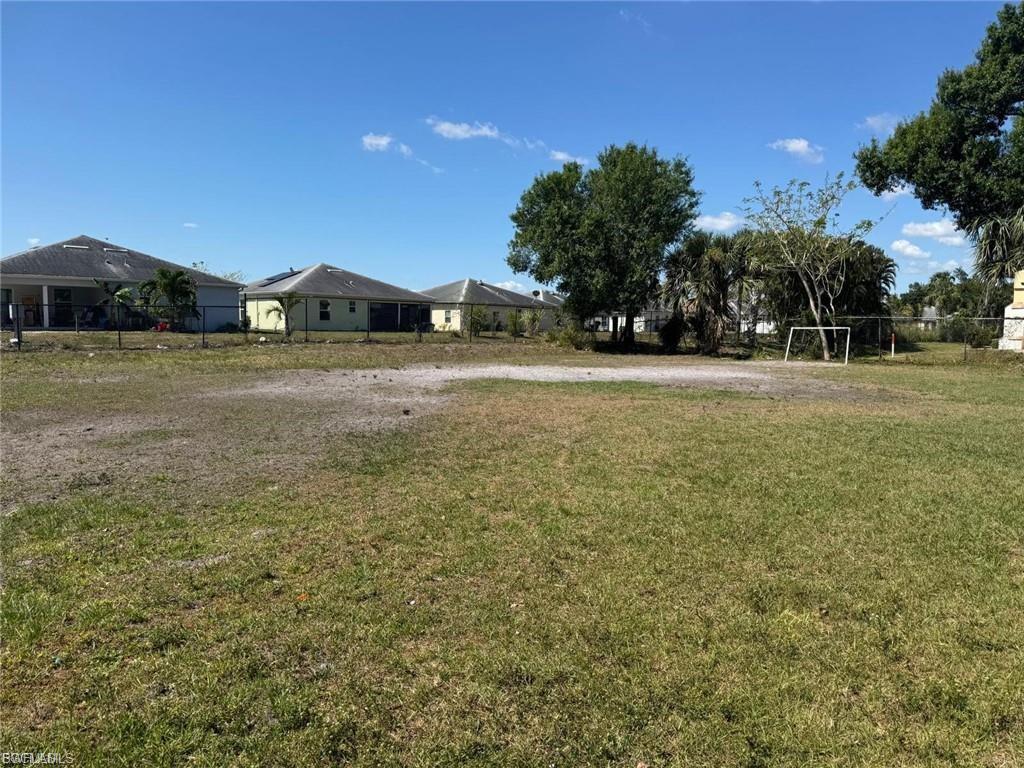 View of yard with an area for sports