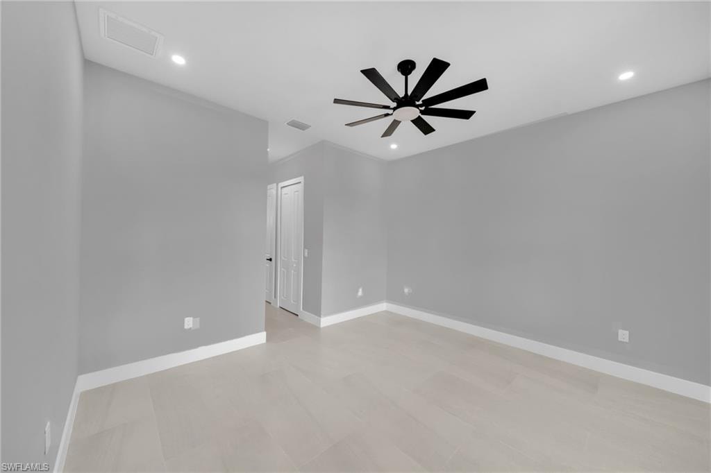 Spare room featuring recessed lighting and ceiling fan