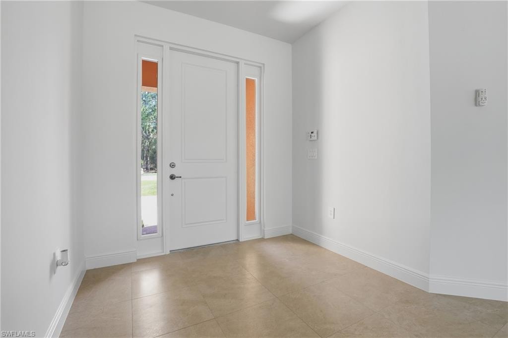 Entrance foyer with baseboards