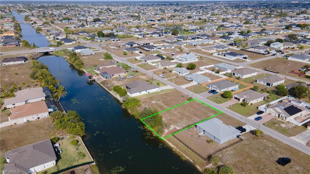 View of property location with nearby suburban area and property parcel outlined