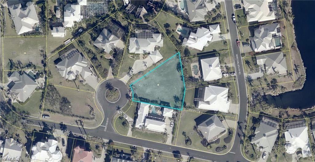 Aerial map of property and surrounding area featuring property parcel outlined