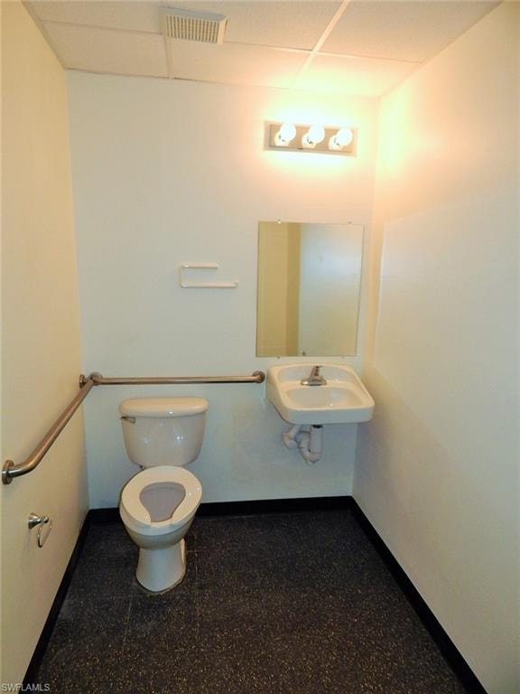 Bathroom featuring toilet and a sink