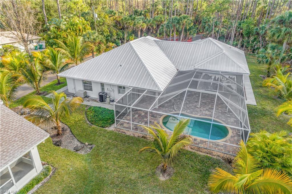 View from above of property featuring a pool