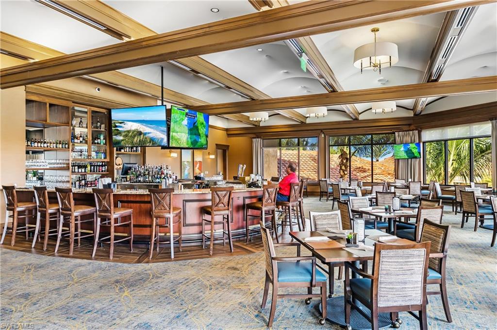 Dining space with beamed ceiling