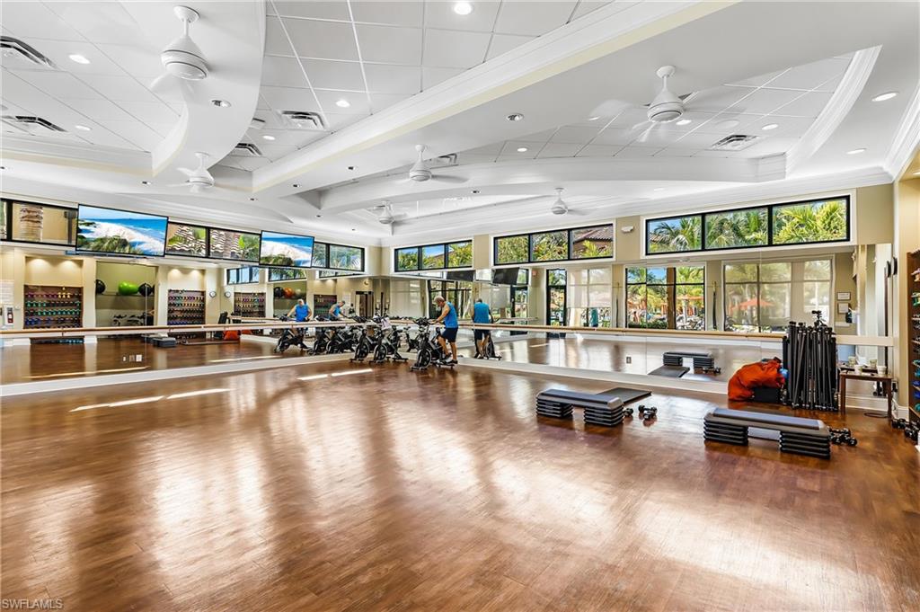 Workout area with crown molding, a ceiling fan, and recessed lighting