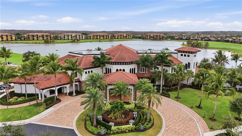 Aerial view of a nearby body of water and a local golf course