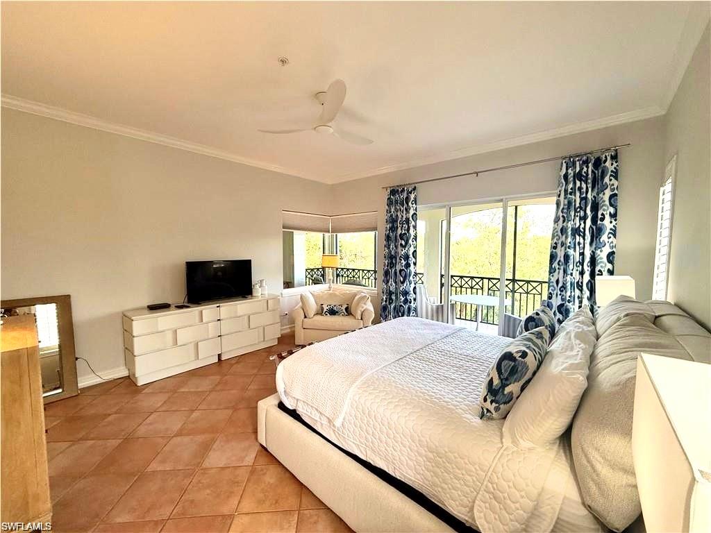 Tiled bedroom with crown molding, access to exterior, and ceiling fan