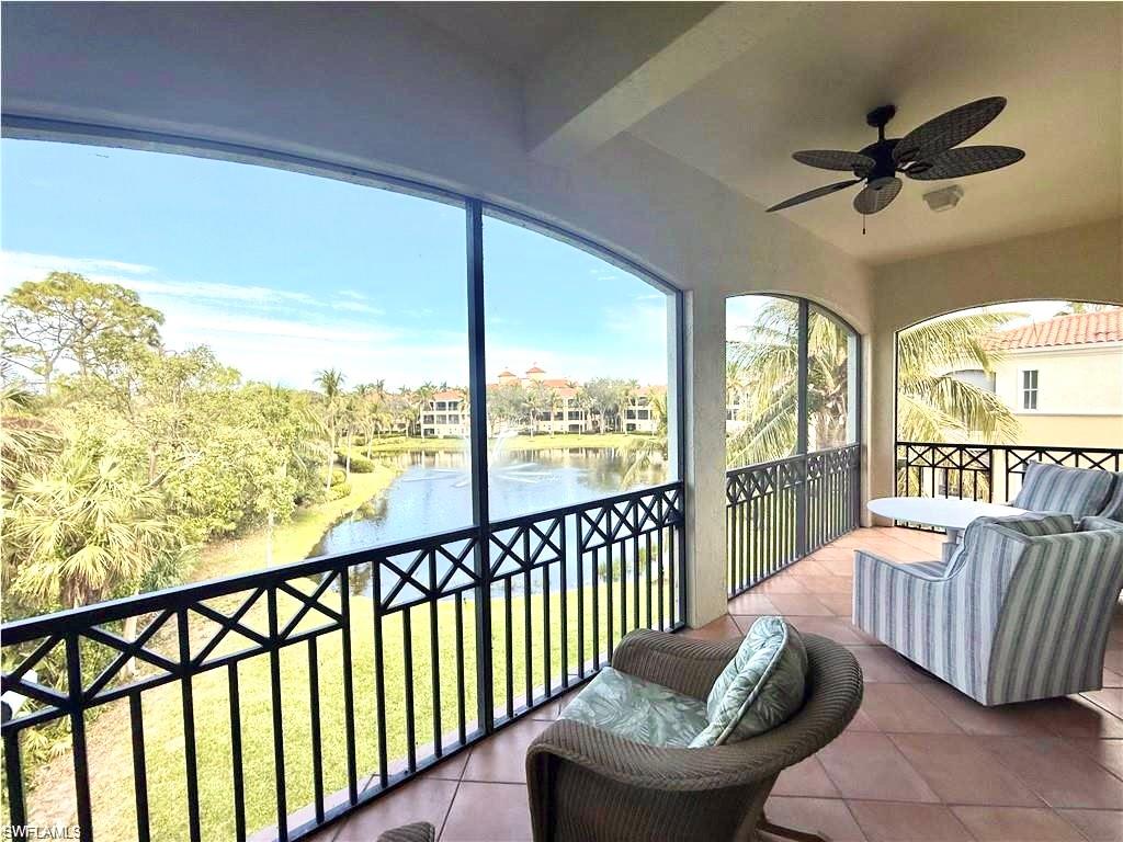 Sunroom with a water view
