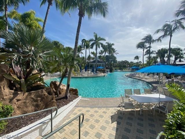 Community pool featuring a patio area