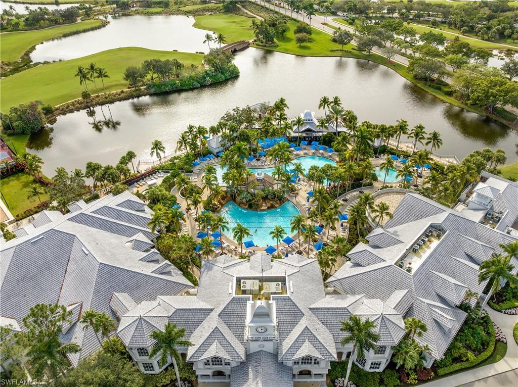 Aerial view of a nearby body of water and a local golf course