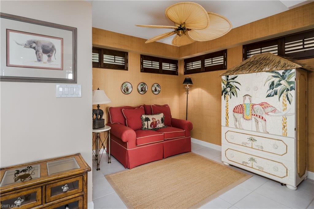 A Cozy DEN off the Foyer. That is a SLEEPER SOFA!!!!