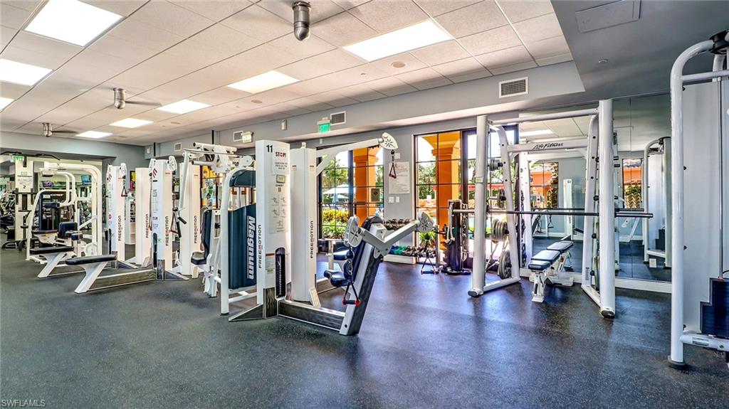 Exercise room with a paneled ceiling