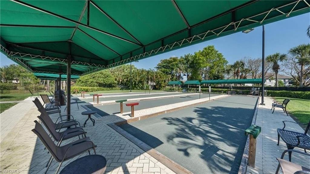 View of property's community with a bocce ball area