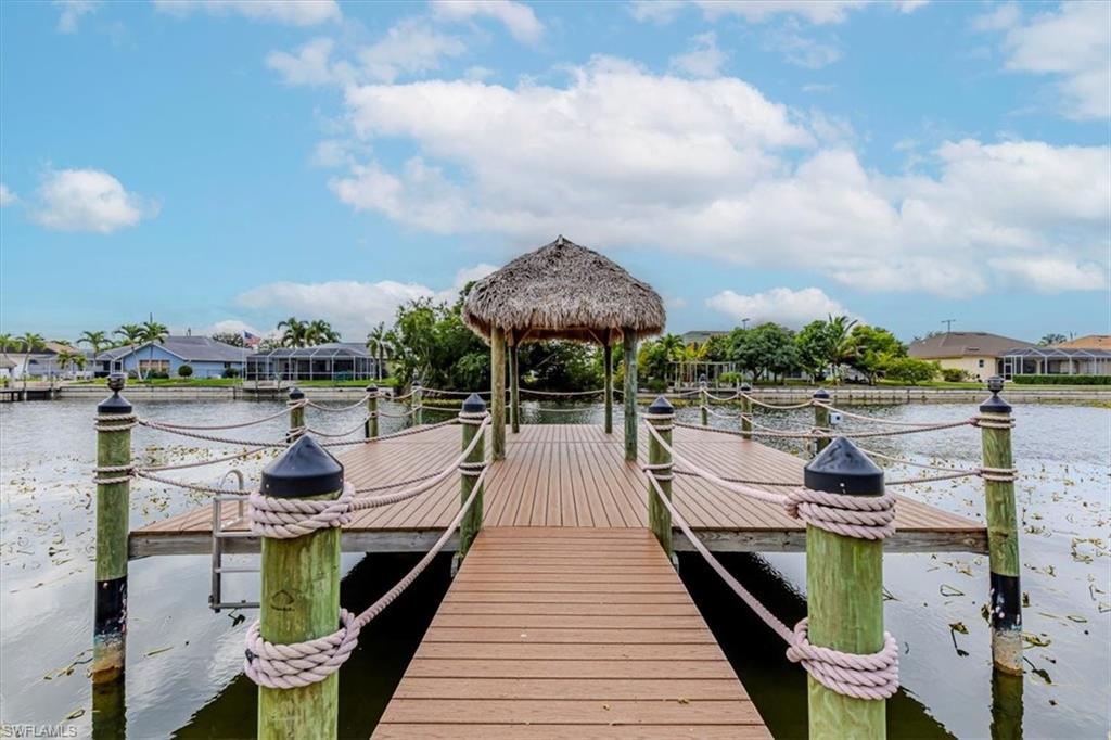 Dock featuring a water view