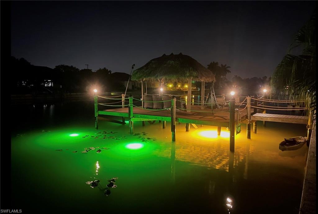 Water view with a dock with Snook Lights