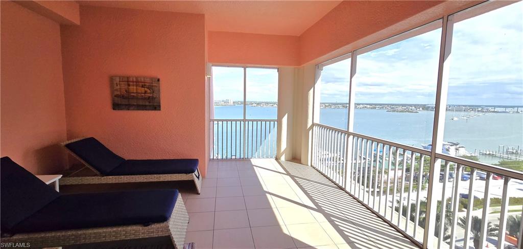 Sreeened balcony on bayside with a water view