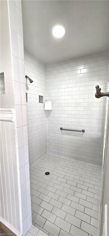Full bathroom featuring a hugestall shower