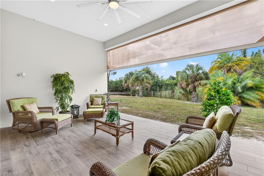 View of patio / terrace with an outdoor hangout area and ceiling fan