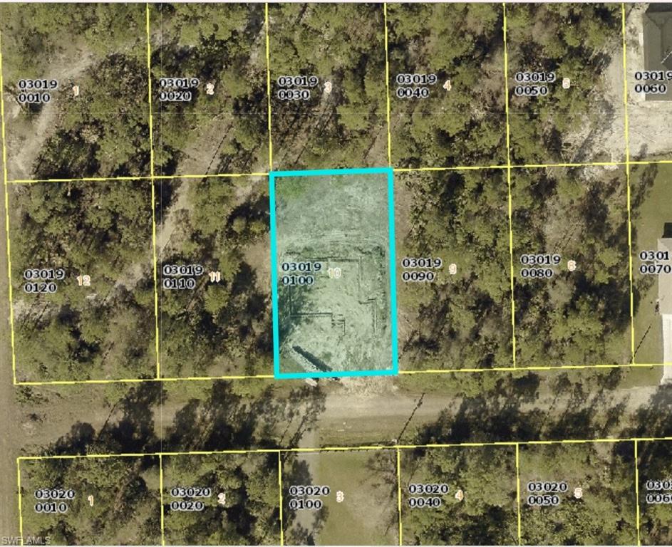 Aerial map of property and surrounding area featuring property parcel outlined