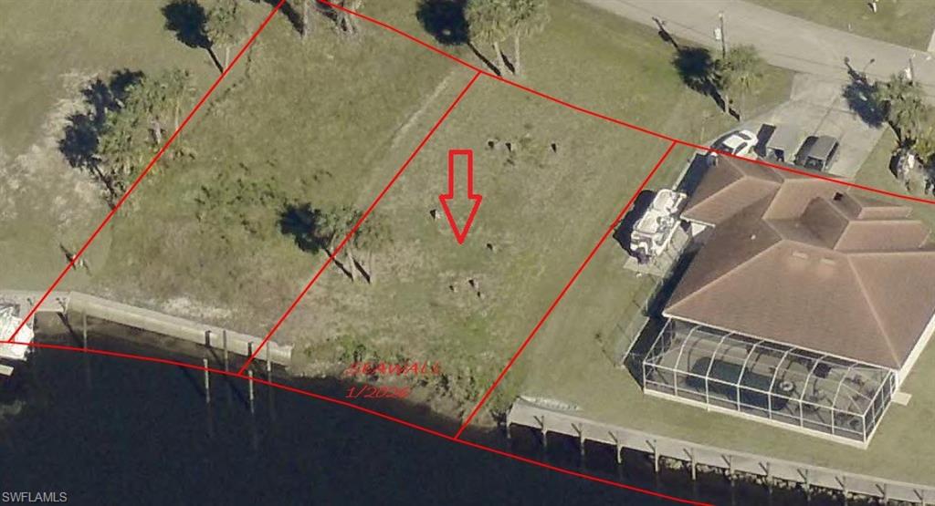 Aerial map of property and surrounding area with property boundaries highlighted