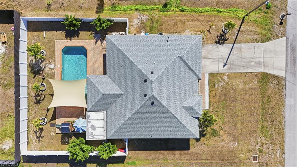 View from above of property with a pool area