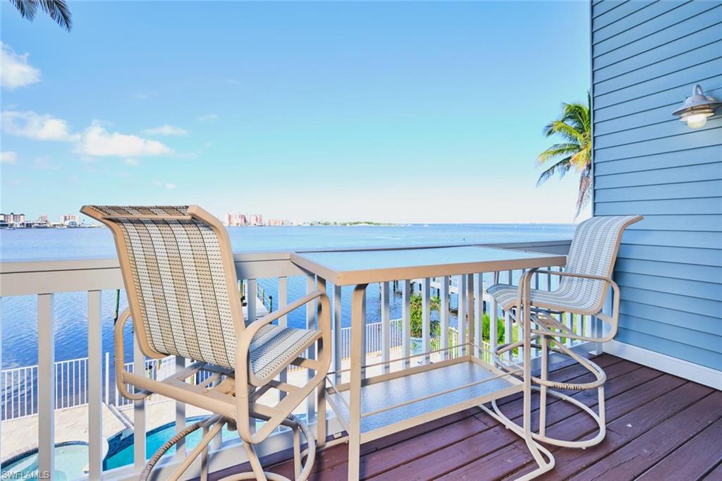 Main living area -  Wooden terrace with a water view