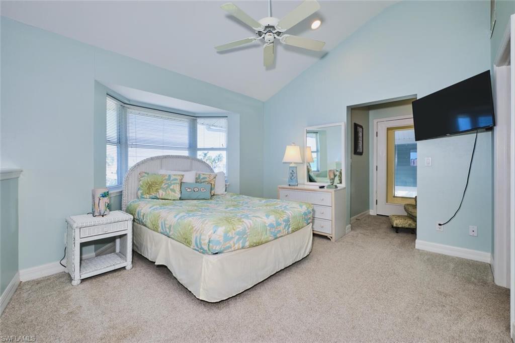 Loft Bedroom featuring light carpet, ceiling fan, high vaulted ceiling, and recessed lighting